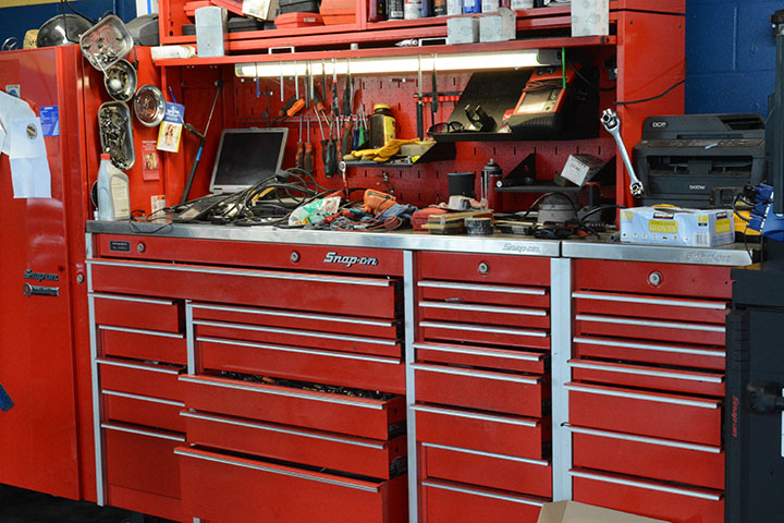 New and traditional mechanic tools complement each other.